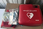 Philips FR2+ Heartstart W/ Expired Pads & No Battery. Fixed Price $179.00.