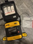 Physio-control Lifepak 1000 Aed Defibrillator, Battery, Carrying Case, Exp. Pads. Fixed Price $375.00.