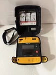 Physio-control Lifepak 1000 Aed Defibrillator With Carry Case & Lithium Battery. Fixed Price $399.00.