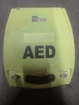 Zoll Aed Plus Defibrillator With Pediatric Pads, Batteries, And Carrying Case. Fixed Price $560.00.